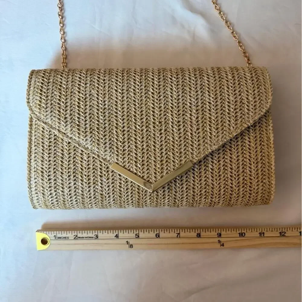 Woven clutch with gold color